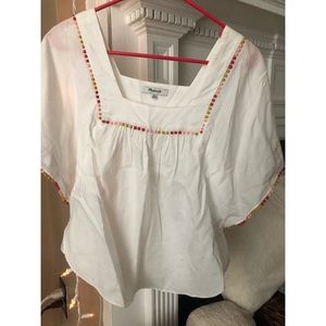 blouse with dotted edging